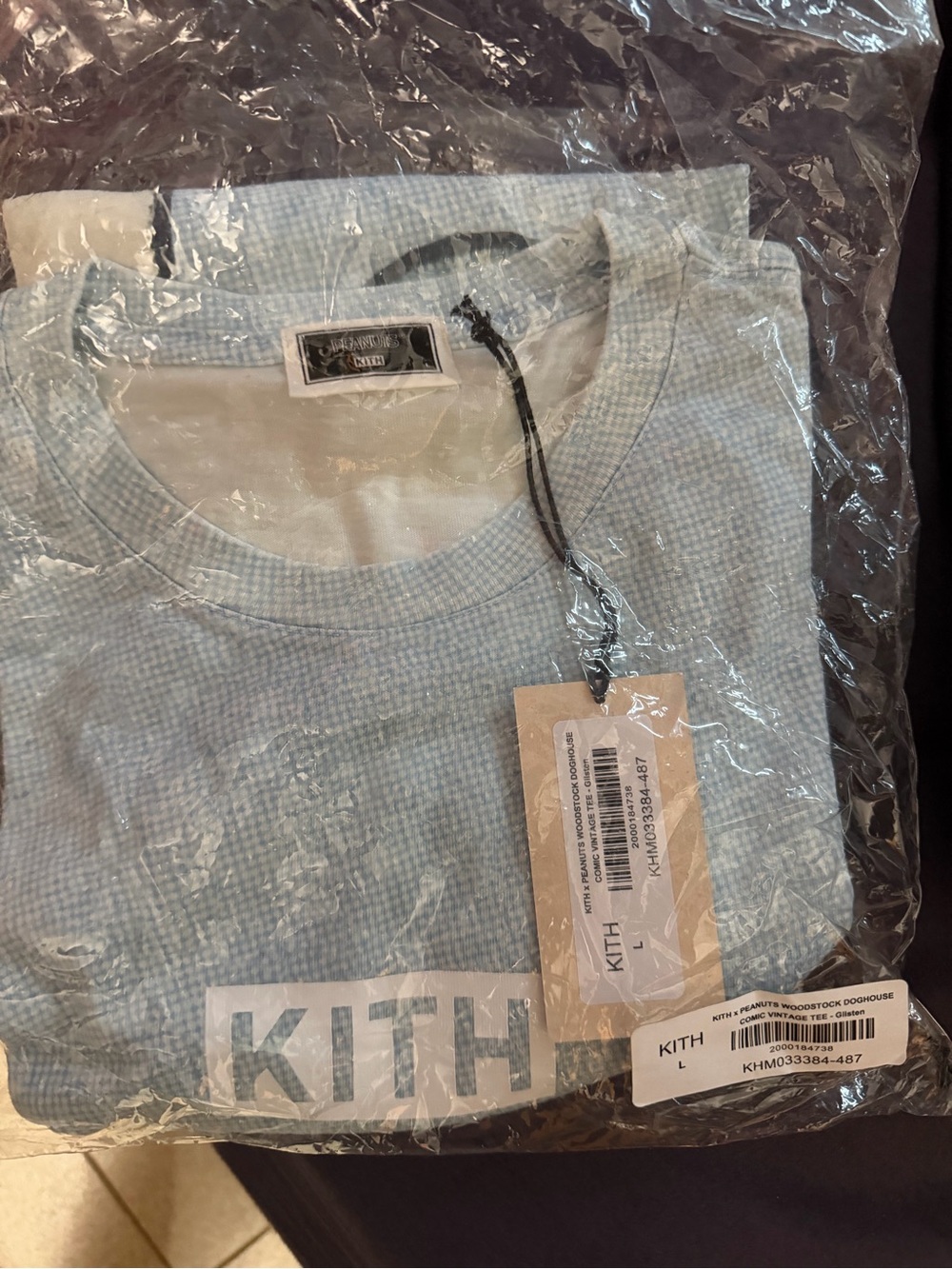 Kith Men's Peanuts Snoopy Woodstock blue tee